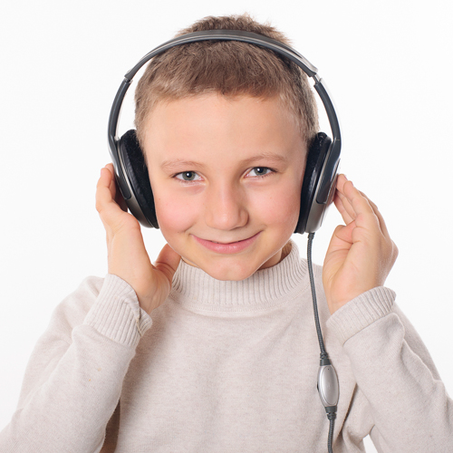 student listening to his headphones